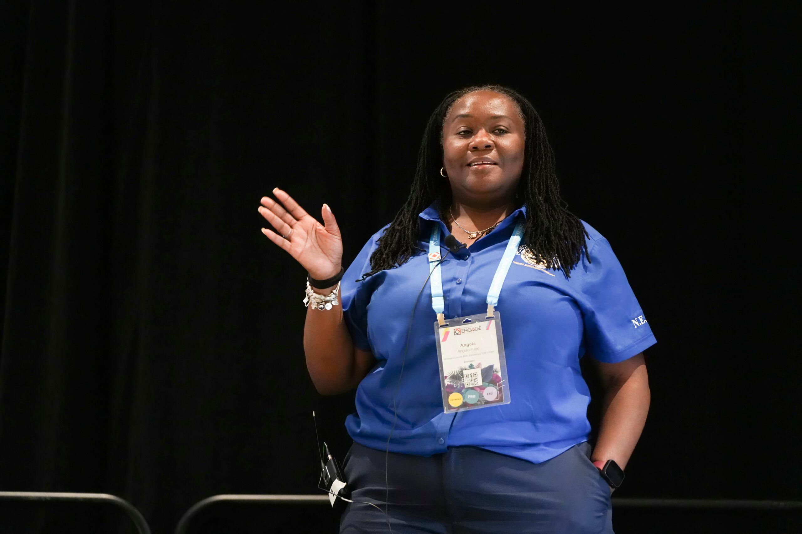 A CentralSquare ENGAGE attendee talking on stage